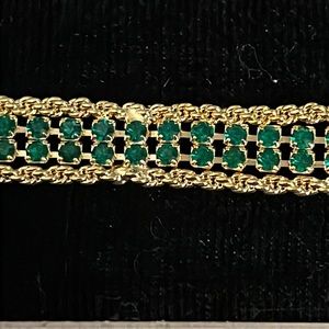 Decorative rope bracelet with green gemstones   Very lightweight.